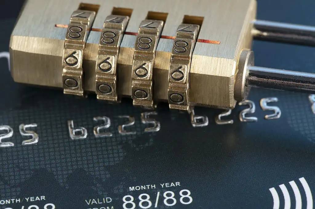 Closeup shot of a lock on credit cards - credit card data security concept